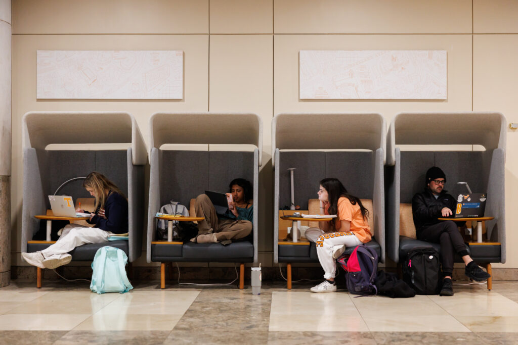 Students use the study pods on first floor of Hodges Library