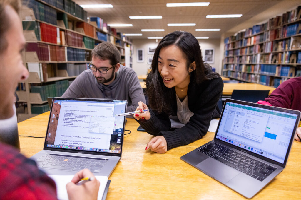 Students work together on one of the group study floors of Hodges Library