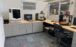 Makerspace area in Pendergrass Library. On the left there is the uPrint professional grade 3D printer. To the right, there are two Taz Lulzbot 6 printers.