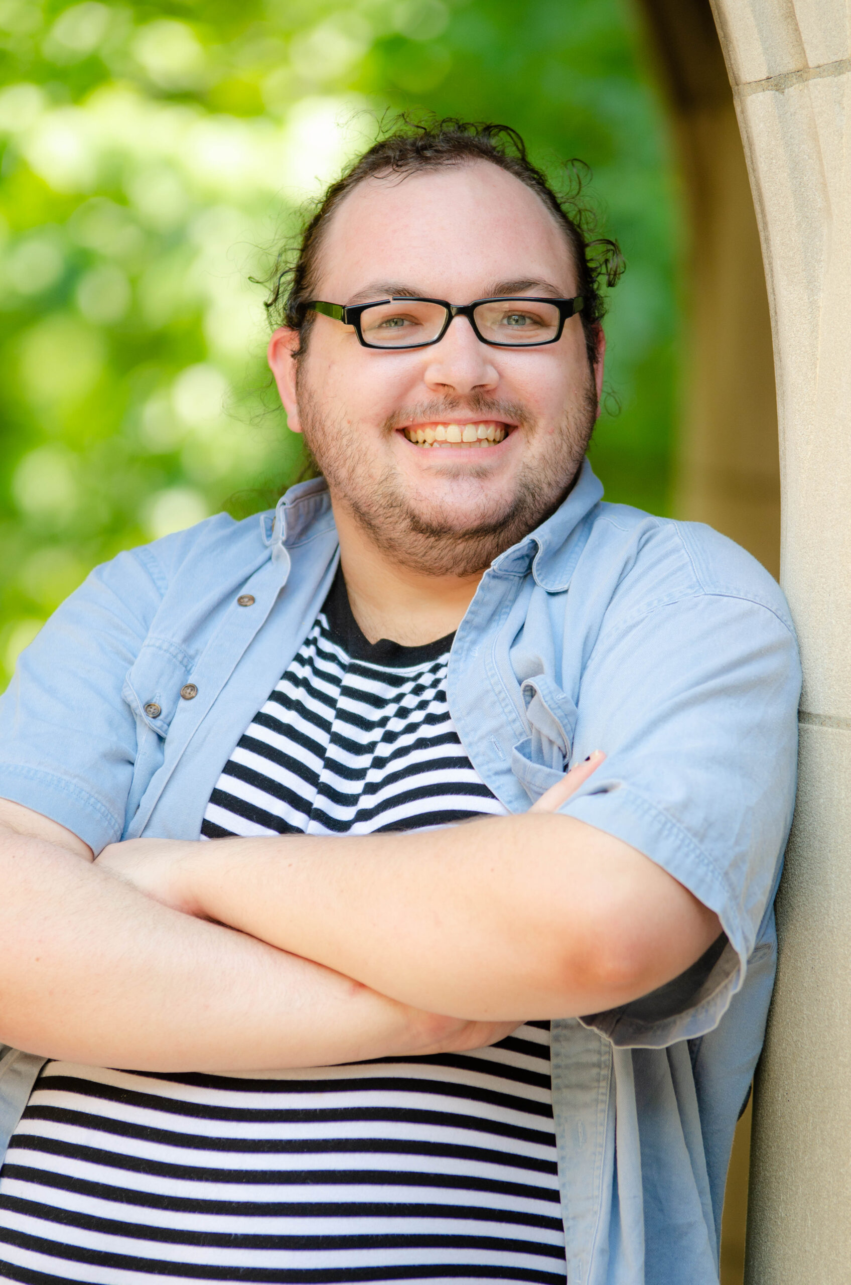Portrait of Joseph leaning against a wall